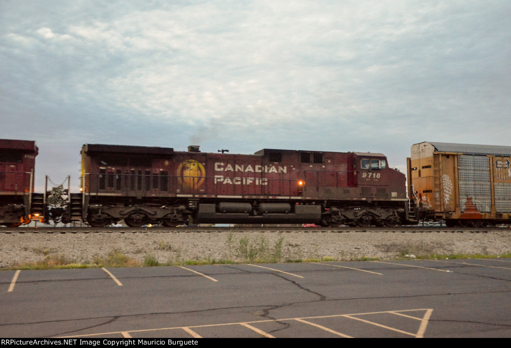 CP AC44CW Locomotive leading a train